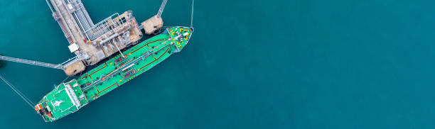 Aerial view tanker ship loading in port, Tanker ship logistic import export business and transportation, with copy space.