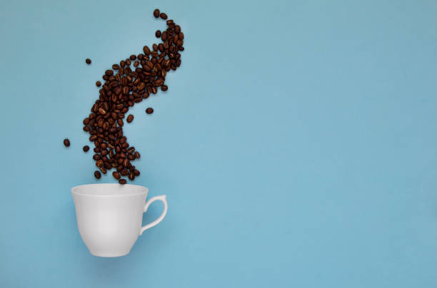 istock Coffee mug and roasted coffee beans concept 1163543103