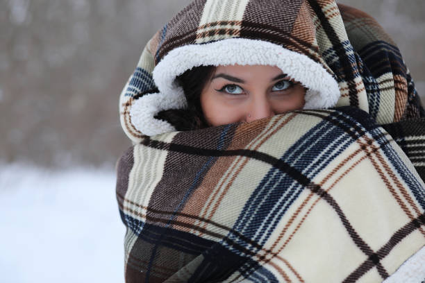 Beautiful girl in a beautiful winter park for a walk