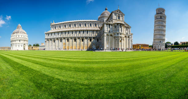 Panoramic view of the Leaning Tower and the Pisa Cathedral in sunny day, Italy Pisa, Italy - June 19, 2019: Panoramic view of the Leaning Tower and the Pisa Cathedral in sunny day, Italy pisa leaning tower of pisa tower famous place stock pictures, royalty-free photos & images