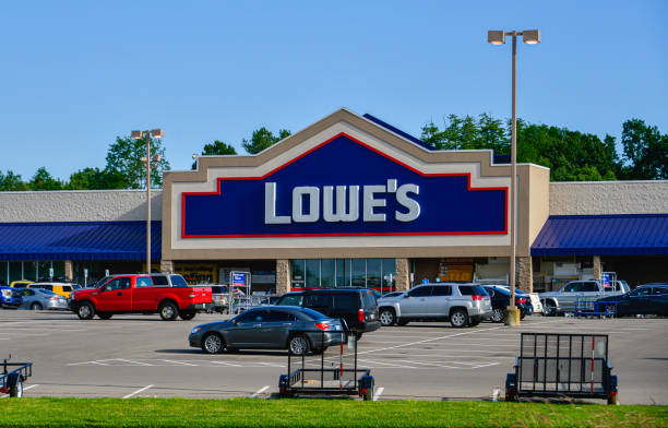 Lowe's Home Improvement Store People in the parking lot of a Lowe’s home improvement store in Jackson, Michigan. lowes home improvement store stock pictures, royalty-free photos & images