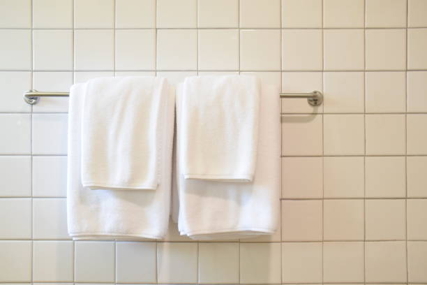 istock White towel on the hanger in bathroom 1163552972