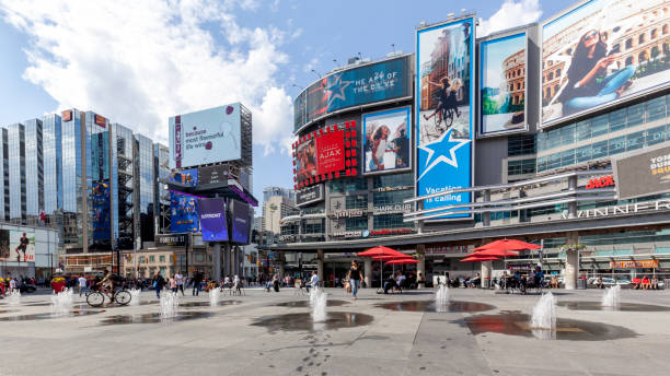 Yonge-Dundas Square in Toronto. Toronto, Canada - May 5th, 2018: Yonge-Dundas Square in Toronto. The Yonge-Dundas intersection is one of the busiest in Canada. toronto dundas square stock pictures, royalty-free photos & images