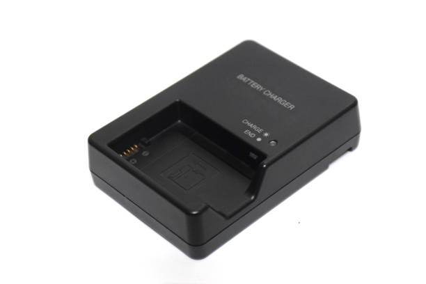 istock Battery charger for battery pack on white background. 1163553836