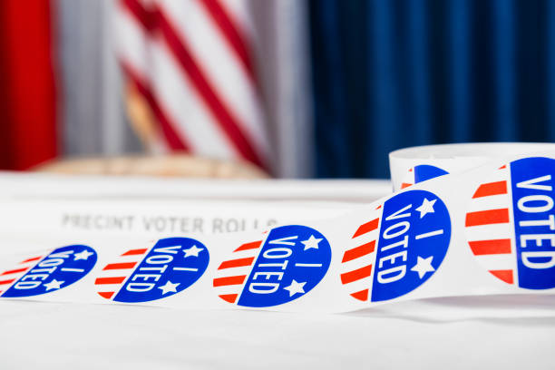 I Voted stickers ready at polling station registration desk