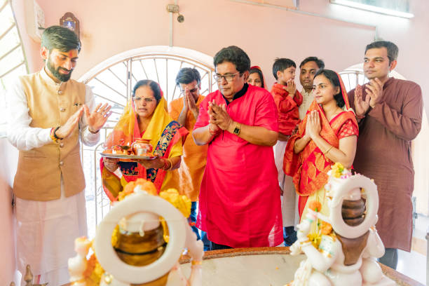 istock A Large Multi-Generation family Praying at a Hindu Temple 1163556454