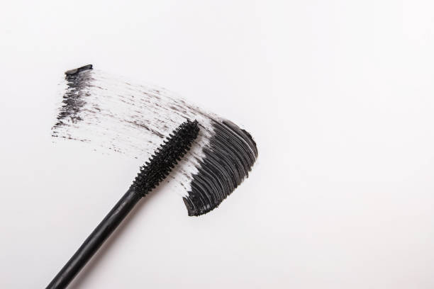 istock Black mascara cosmetics stroke isolated on white background 1163556585