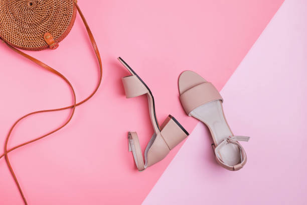 istock Stylish summer accessories isolated on pink background. 1163556594