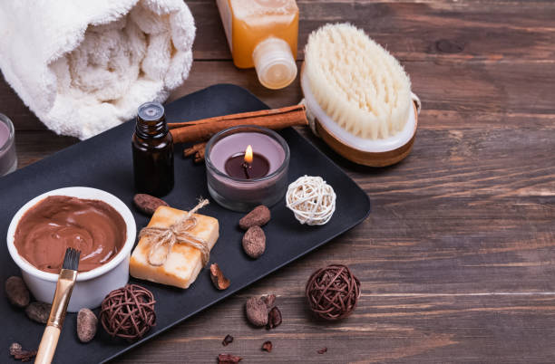 istock Chocolate spa set on the wooden background, close-up. 1163556715