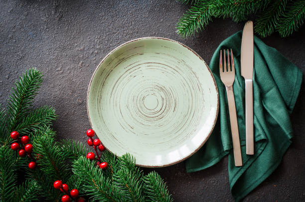 istock Christmas festive table setting with xmas decorations. Christmas background for writing the menu. 1163558756