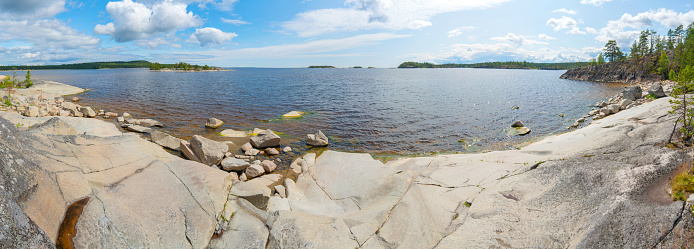 Islands in Lake Ladoga. Beautiful landscape - water, pines and boulders.