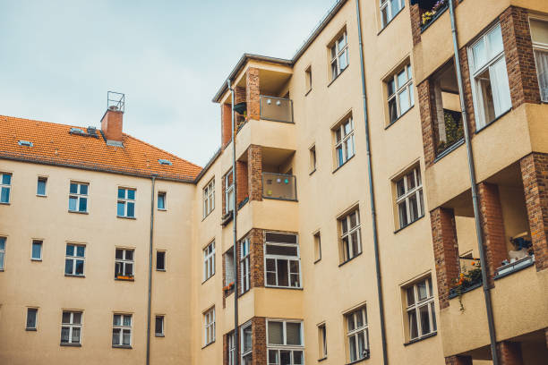 istock apartment building on a grey day at berlin, germany 1163562798