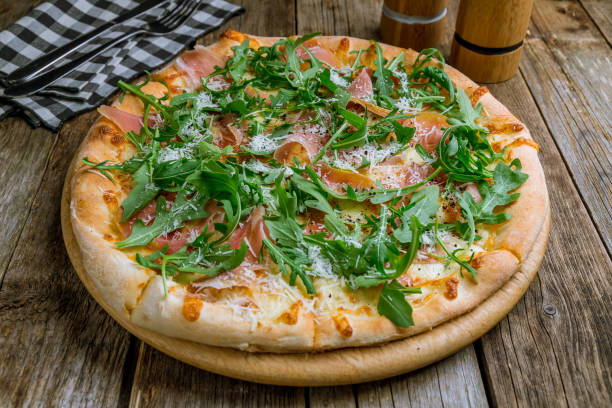 istock Pizza with Parma ham and arugula 1163563088
