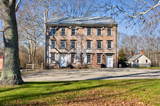 An old general store in Allaire Village, New Jersey. Allaire village was a bog iron industry town in New Jersey during the early 19th century. The general store contained an apothecary, a US Post Office, a Butcher Shop and a Furniture store as well as carrying a wide array of merchandise from fresh produce and dairy products to dry goods and household items and tools.