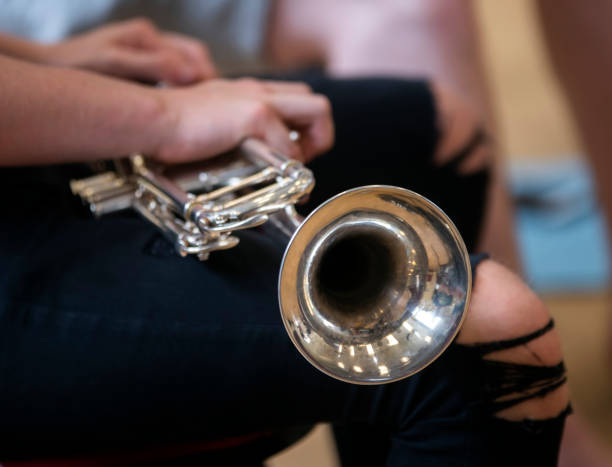 istock trumpet playing at a school rehearsal 1163571231