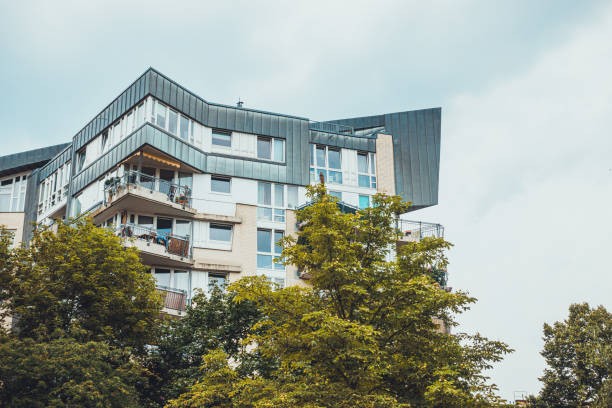 istock futuristic apartment house on grey background 1163572937