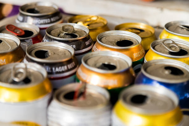 Macro of open and dusty beer cans