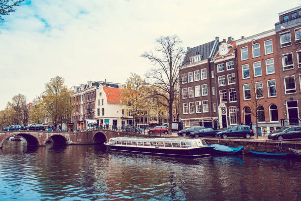 istock Amsterdam Canal Tourism 1163577397