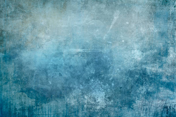 istock Splattered blue paint on a canvas, grungy background or texture 1163578017