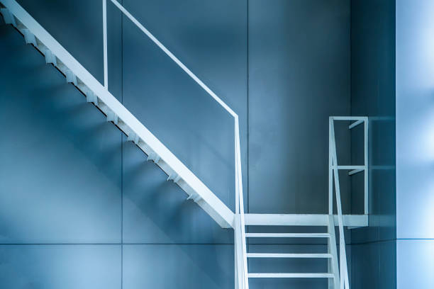 istock White iron staircase next to the building 1163581306