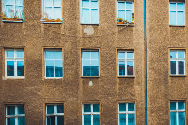 istock apartment building on a grey day at berlin, germany 1163581334