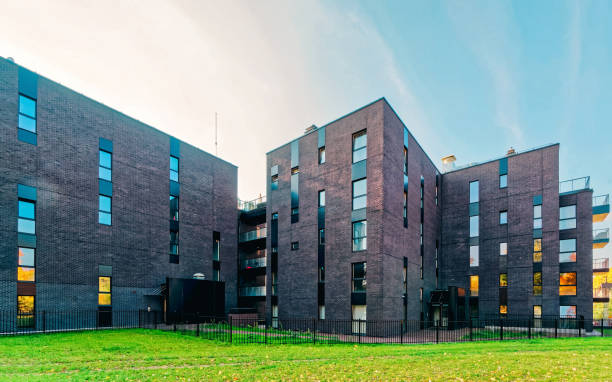 istock EU Glass architecture of modern apartment building 1163584332