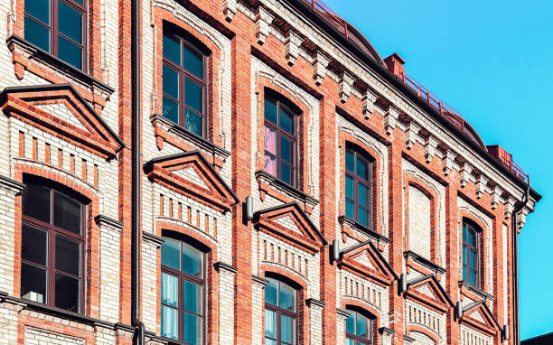 istock EU Fragment of brick apartment building 1163585562