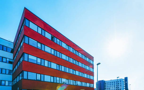 istock EU Sunset and Modern corporate business office building skyscraper 1163587141