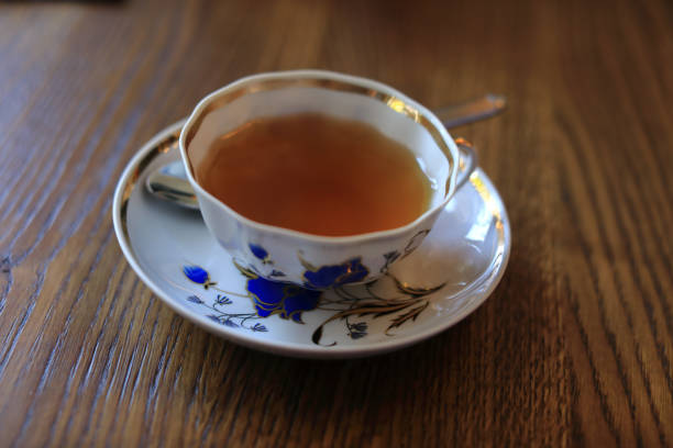 istock Cup of tea on wooden table 1163588113