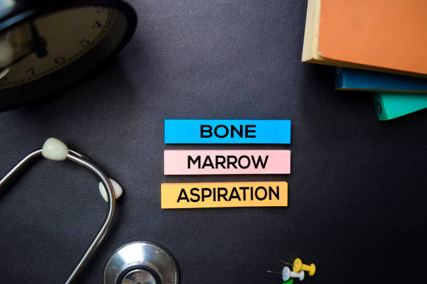 istock Bone Marrow Aspiration text on Sticky Notes. Top view isolated on black background. Healthcare/Medical concept 1163589056