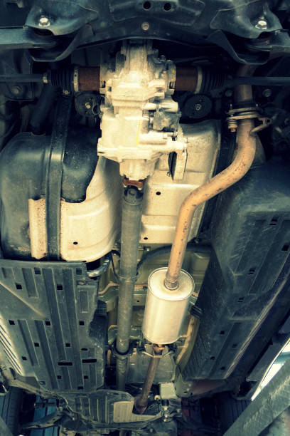 istock Exhaust under the car in the workshop 1163593382