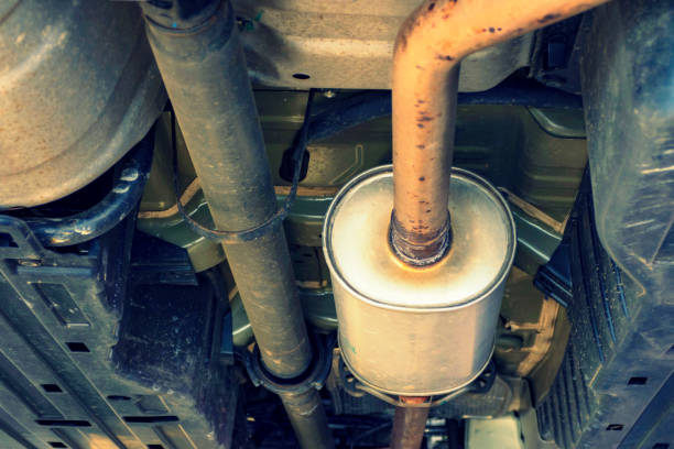 istock Exhaust under the car in the workshop 1163593409