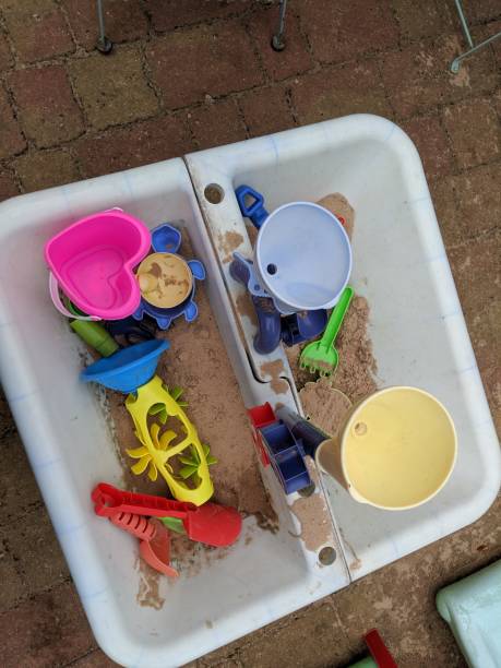 istock Colourful toys in the sandpit 1163597807
