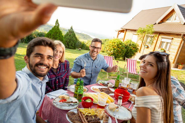 istock Backyard barbecue party selfie 1163599938