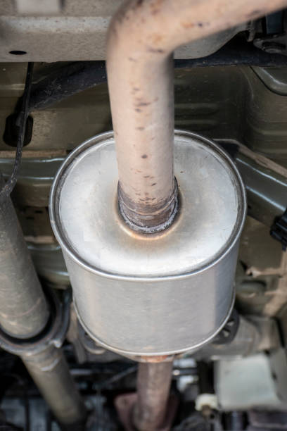 istock Exhaust under the car in the workshop 1163600589
