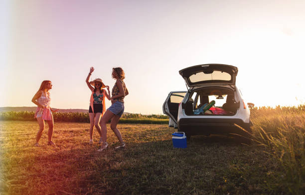 istock Dancing millennial girls enjoying their time while traveling 1163600808