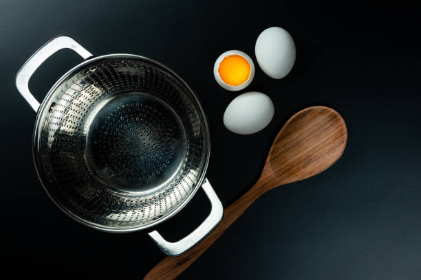 istock Water drain for pasta on black matte background 1163601127