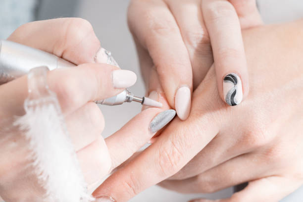 istock Session hardware manicure in the spa salon 1163602765