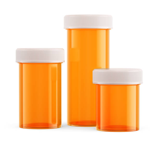 fiale da farmacia ambra isolate su sfondo bianco - antibiotic pain cut out bottle foto e immagini stock