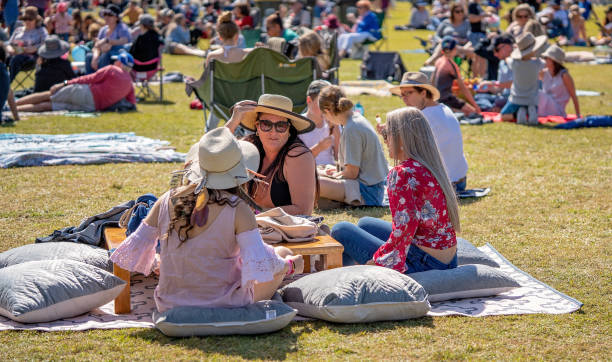 Girlfriends Enjoying Outdoors At Food Festival Mackay, Queensland, Australia - 20th July 2019: Crowd of people at annual city outdoor food and wine festival food festival stock pictures, royalty-free photos & images