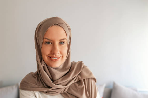 istock Smiling Muslim Woman Wearing Hijab 1163604096