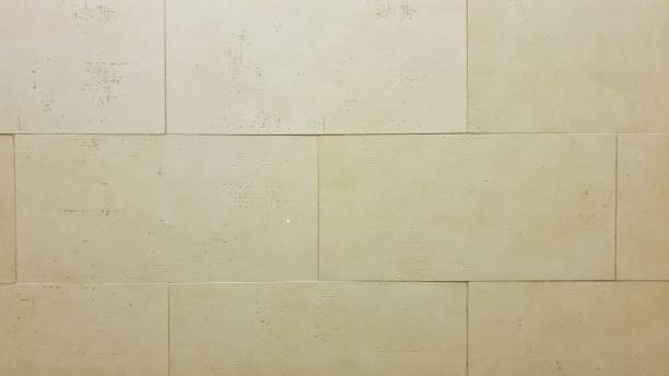 istock Pale yellow glazed porcelain tiles 1163605961