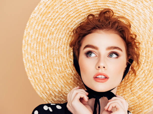 istock Beautiful girl wearing hat 1163606175
