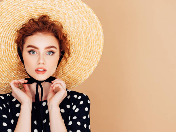 istock Beautiful girl wearing hat 1163607352