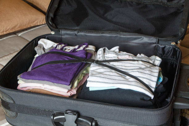 istock To pack the suitcase on a bed 1163609234