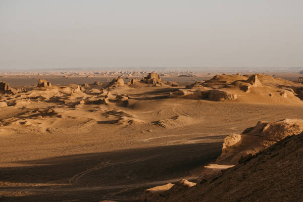istock Sunrise in the Lut Desert 1163610221