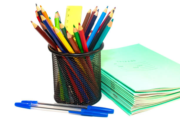 istock Color pencils and notebooks for school isolated on white 1163610865