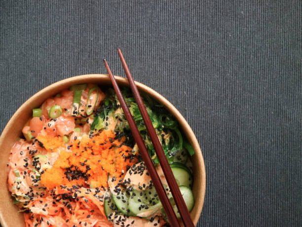 istock Salmon poke with wooden chopsticks 1163613408