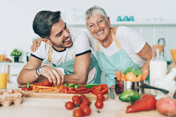 istock Mother and son cooking together 1163614675