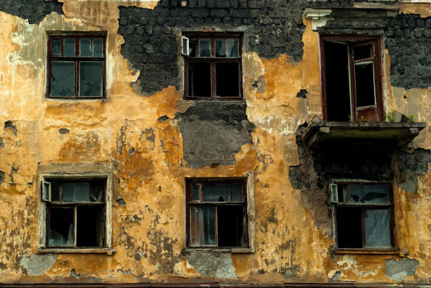 istock wall of an abandoned dilapidated old building 1163619365